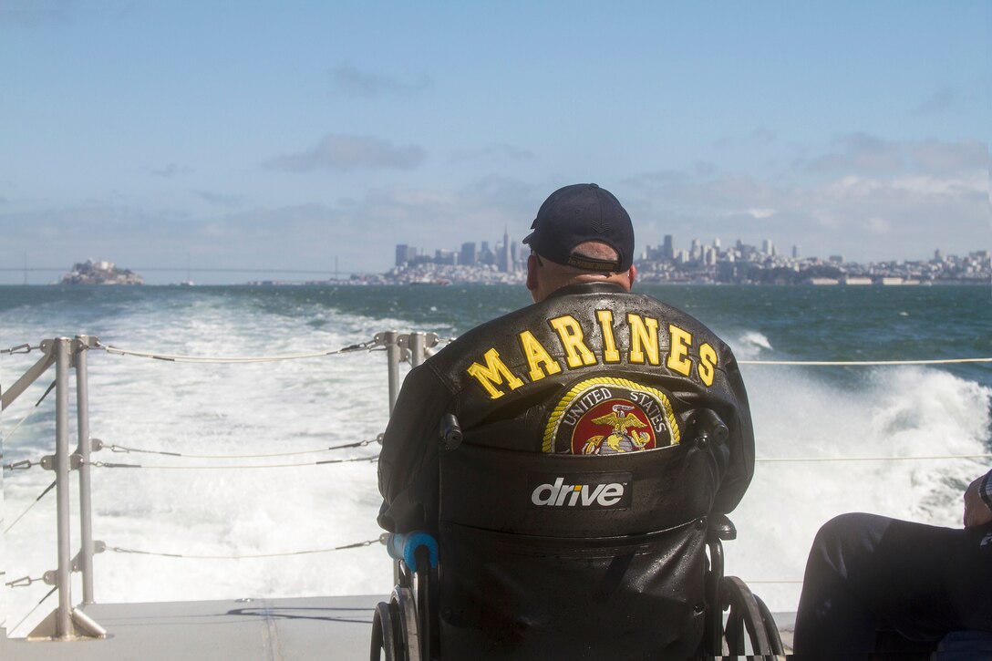 A military veteran takes in the views of the San Francisco Bay Area May 25 while onboard the M/V John A. B., Dillard, Jr., a U.S. Army Corps of Engineers San Francisco District vessel. The outing was organized by the Department of California Disabled American Veterans. 