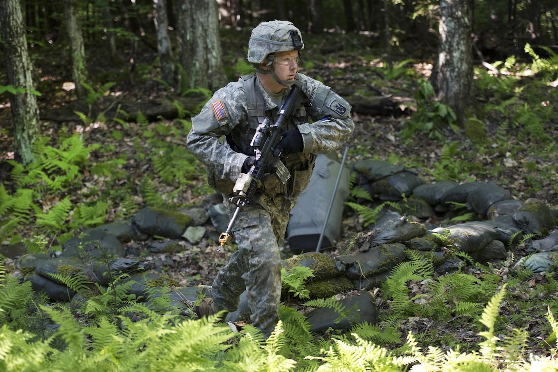 Army Sgt. Kevin Grey advances to his next objective during annual training at Camp Ethan Allen Training Site, Jericho, Vt., June 15, 2016. Grey is assigned to the Vermont National Guard’s Company A, 3rd Battalion, 172nd Infantry Regiment, 86th Infantry Brigade Combat Team. Air National Guard photo by Tech. Sgt. Sarah Mattison