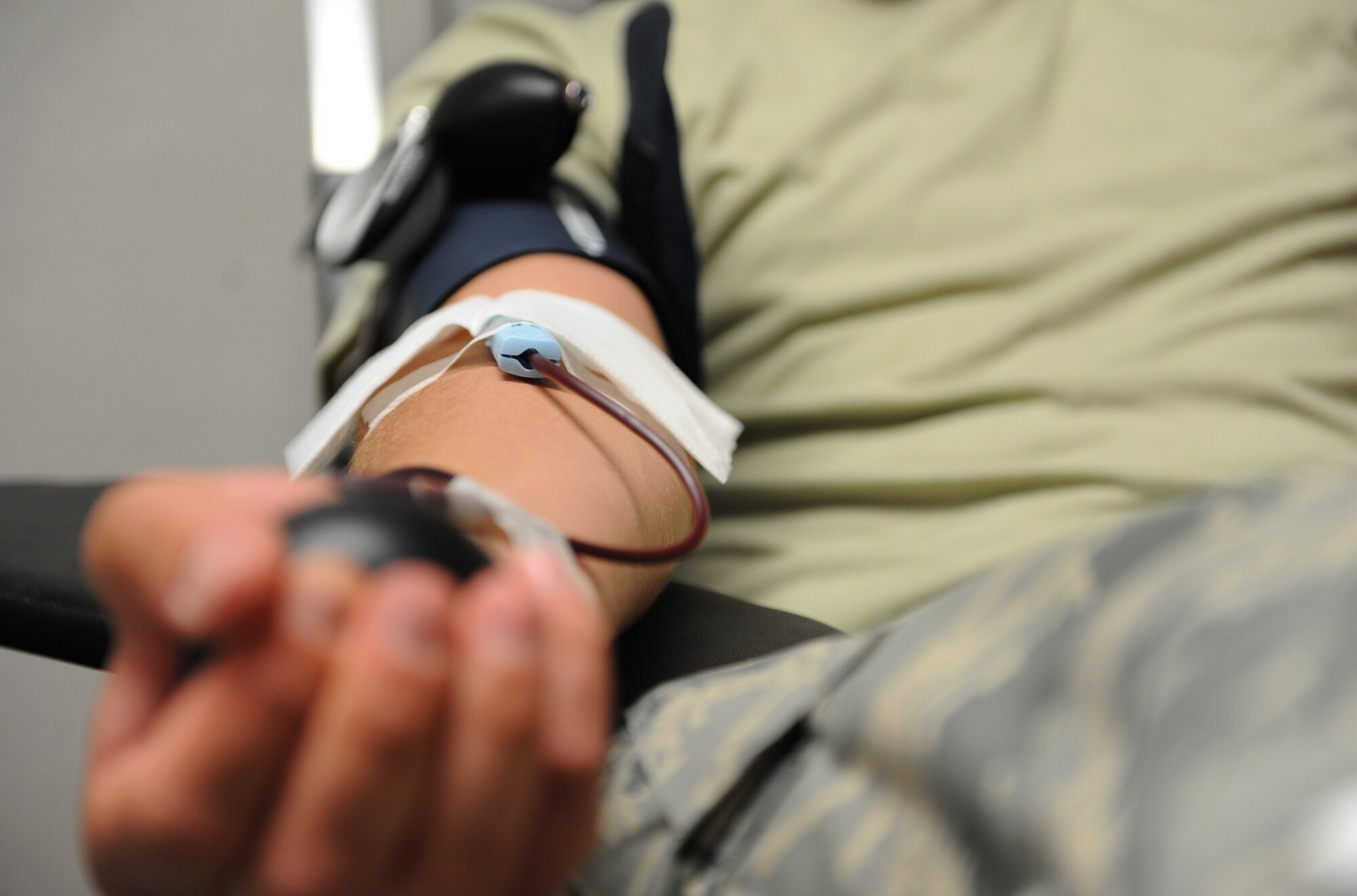 Airman Basic Taylor Gull, 336th Training Squadron, has his blood drawn during a blood drive at the Sablich Center June 21, 2016, Keesler Air Force Base, Miss. To donate you must be at least 18 years old, have been feeling well for at least three days, be well hydrated and have eaten prior to donating. Tattoos, acupuncture, foreign travel and some immunizations can defer volunteers from donating for up to 12 months. The Keesler Blood Donor Center is located in the 81st Medical Group's Arnold Medical Annex. (U.S. Air Force photo by Kemberly Groue)