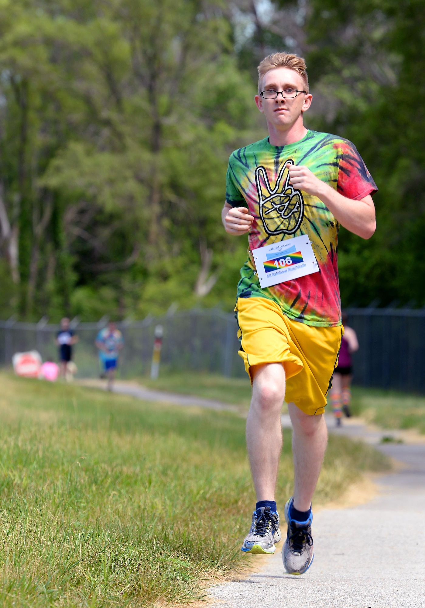 Airman 1st Class Steven Hanners, from the 20th Intelligence Squadron, participates in the Rainbow 5K Run/Walk June 23 at Offutt Air Force Base, Neb. Hanners finished 1st in the run with a time of 17 minutes, 16 seconds. The event was held as part of LGBT pride month to celebrate diversity among DOD members. (U.S. Air Force photo by Delanie Stafford/Released)