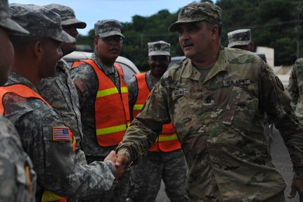 1st MSC, Commanding Sgt. Maj. Harry Muñoz congratulates the Soldier for their time and effort they gave for this training.