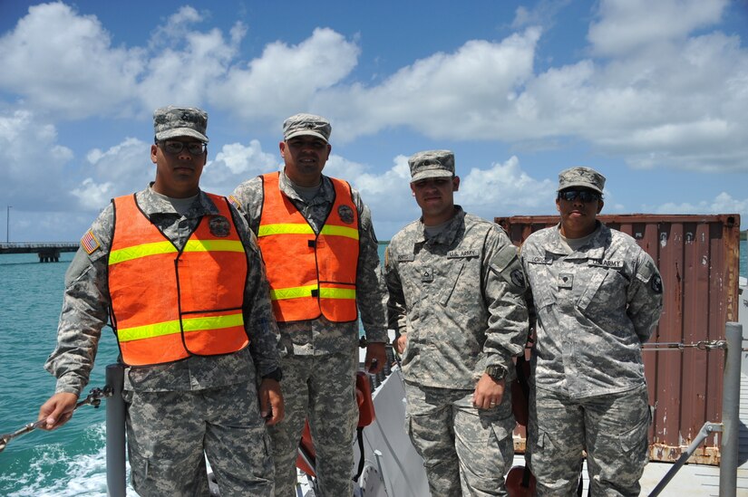 The 390th SPOC Soldiers getting a ride on the LCM brought by the Puerto Rico Army National Guard, LCD.
