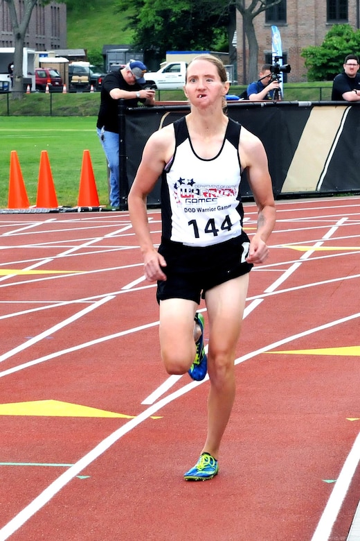 U.S. Army Veteran Sgt. 1st Class Katie Kuiper, from San Antonio, Texas, sets the pace during the 800-meter event at the Track portion of the 2016 Department of Defense Warrior Games held at the U.S. Military Academy at West Point, New York, June 16. The DoD Warrior Games, June 15-21, is an adaptive sports competition for wounded, ill and injured service members and Veterans. (U.S. Army photo by Master Sgt. D. Keith Johnson/Released)
