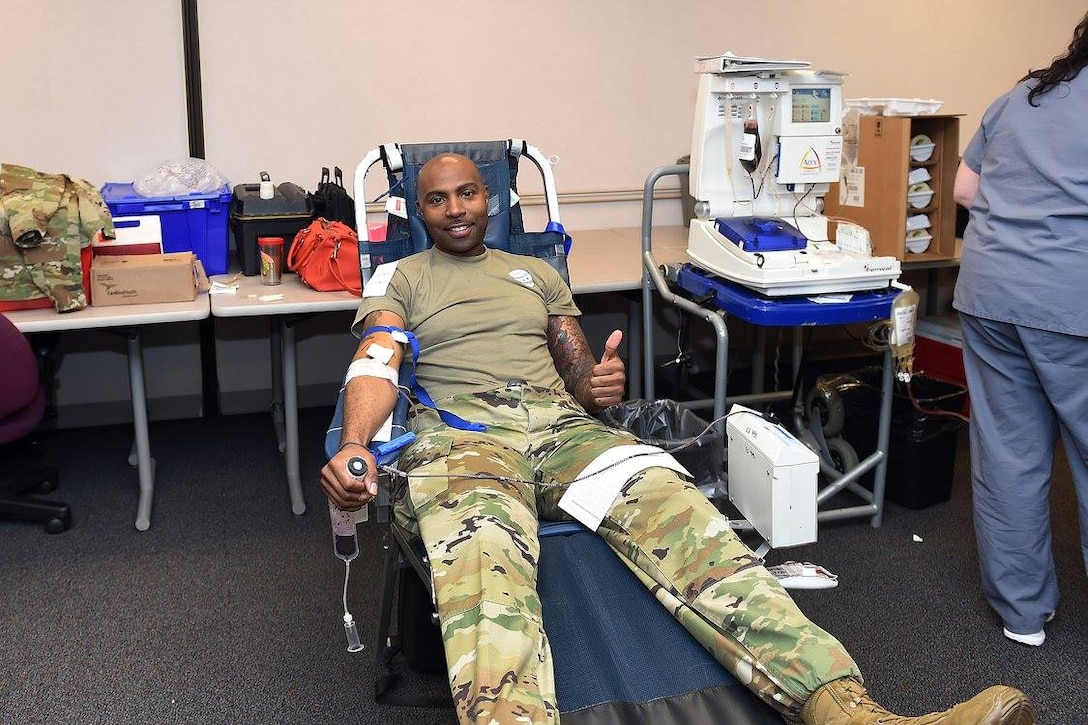 Master Sgt. Audley Logan, Assistant IG, gives blood during a blood and plasma drive coordinated by Defense Contract Management Agency-Chicago, June 22, 2016. The DCMA staff, along with the soldiers assigned to the 85th Support Command, donated a little more than the hospital commitment. 
(Photo by Ms. Elayne Evans)