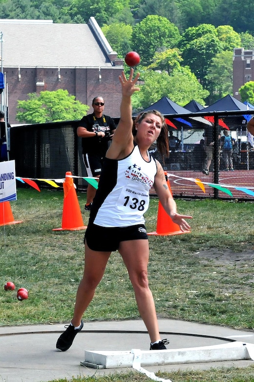 U.S. Army Reserve Staff Sgt. Ashley Anderson, from Winnebago, Minnesota, throws a shot put during the Field portion of the 2016 Department of Defense Warrior Games held at the U.S. Military Academy at West Point, New York, June 16. The DoD Warrior Games, June 15-21, is an adaptive sports competition for wounded, ill and injured service members and Veterans. (U.S. Army photo by Master Sgt. D. Keith Johnson/Released)