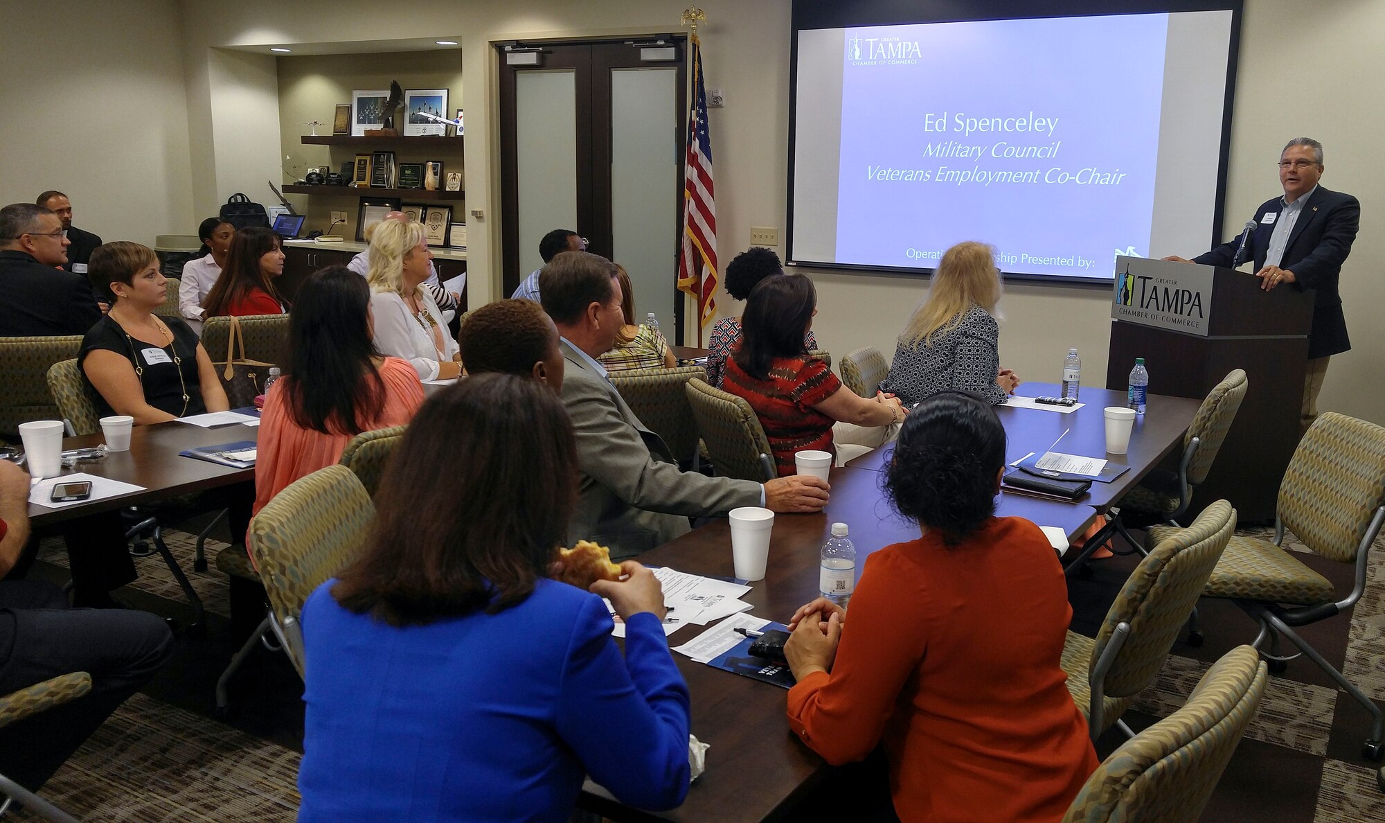 Edward Spenceley, Military Council Veterans Employment Co-Chair, greets attendees of Operation Partnership: Civilian Career Day 2016 at the Greater Tampa Chamber of Commerce in Tampa, Fla., June 24, 2016. During the event, service members had the opportunity to partner with a businessperson and see what a typical day in a civilian career would be like. (U.S. Air Force photo by Staff Sgt. Shandresha Mitchell)