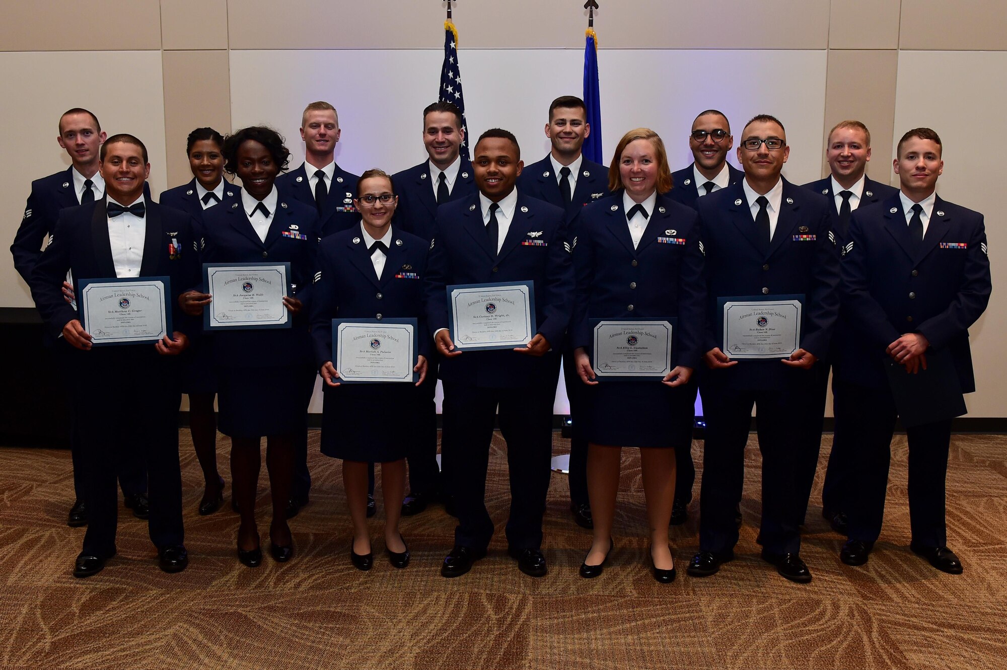 Buckley Airman Leadership School Class 16-E stand together after their graduation June 23, 2016, at the Leadership Development Center on Buckley Air Force Base, Colo. This graduation represents an important part of enlisted force professional military education, teaching valuable skills required for supervisors. (U.S. Air Force photo by Airman 1st Class Gabrielle Spradling/Released)