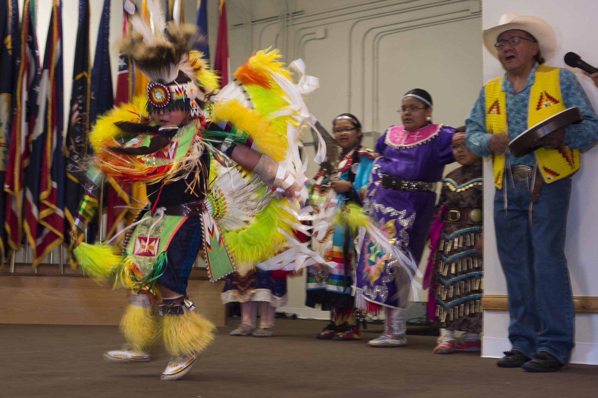 A dancer from the Little Sun Drum and Dance Group performs a traditional Native American dance during the Joint Services Multicultural Event at F.E. Warren Air Force Base, Wyo., June 22, 2016. This is the first year the base held an event that celebrated all the cultural and diversity groups together. (U.S. Air Force photo by Staff Sgt. Christopher Ruano)