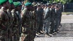 Papua New Guinea soldiers and U.S. Marines and Sailors stand in formation during the opening remarks for Exercise Koa Moana, June 18, 2016, at Taurama Barracks, Papua New Guinea. The multi-national, bilateral exercise is designed to improve interoperability and relations through mil-to-mil training and by sharing infantry, engineering, medical and law enforcement skills. The Papua New Guinea soldiers are with Charlie Company, 1st Battalion, 1st Royal Pacific Islands Regiment, Papua New Guinea Defence Force. The Marines and Sailors are with Task Force Koa Moana, originally assigned to I and I Marine Expeditionary Force. 