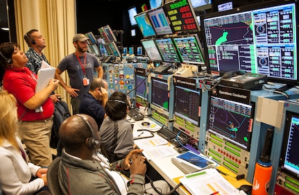 KEKAHA, Hawaii (June 8, 2015) Military, NASA, and Jet Propulsion Laboratory members observe NASA's low-density supersonic decelerator (LDSD) test vehicle trajectory after its launch from U.S. Navy's Pacific Missile Range Facility in Kauai, Hawaii. NASA's LDSD project is designed to investigate and test breakthrough technologies for landing future robotic and human Mars missions, and safely returning large payloads to Earth. 
