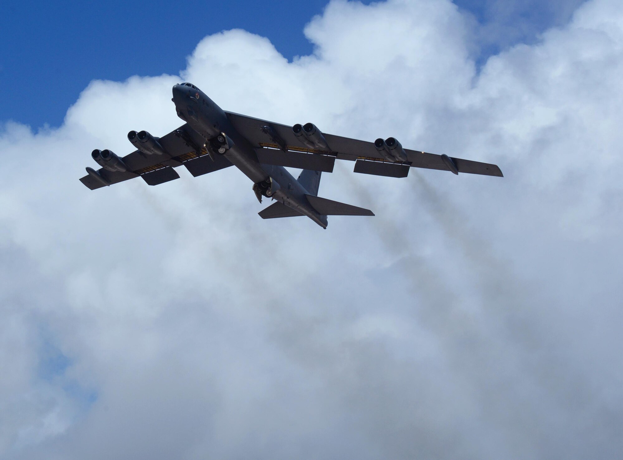 A U.S Air Force B-52 Stratofortress bomber from Minot Air Force Base, North Dakota, takes flight June 16, 2016, at Andersen Air Force Base, Guam. The aircraft is deployed in support of U.S. Pacific Command’s Continuous Bomber Presence operations. These aircraft and the men and women who fly and support them provide a significant capability that enables U.S. readiness and commitment to deterrence, provides assurances to allies, and strengthens regional security and stability in the Indo-Asia-Pacific region. (U.S. Air Force photo by Airman 1st Class Alexa Ann Henderson/Released)