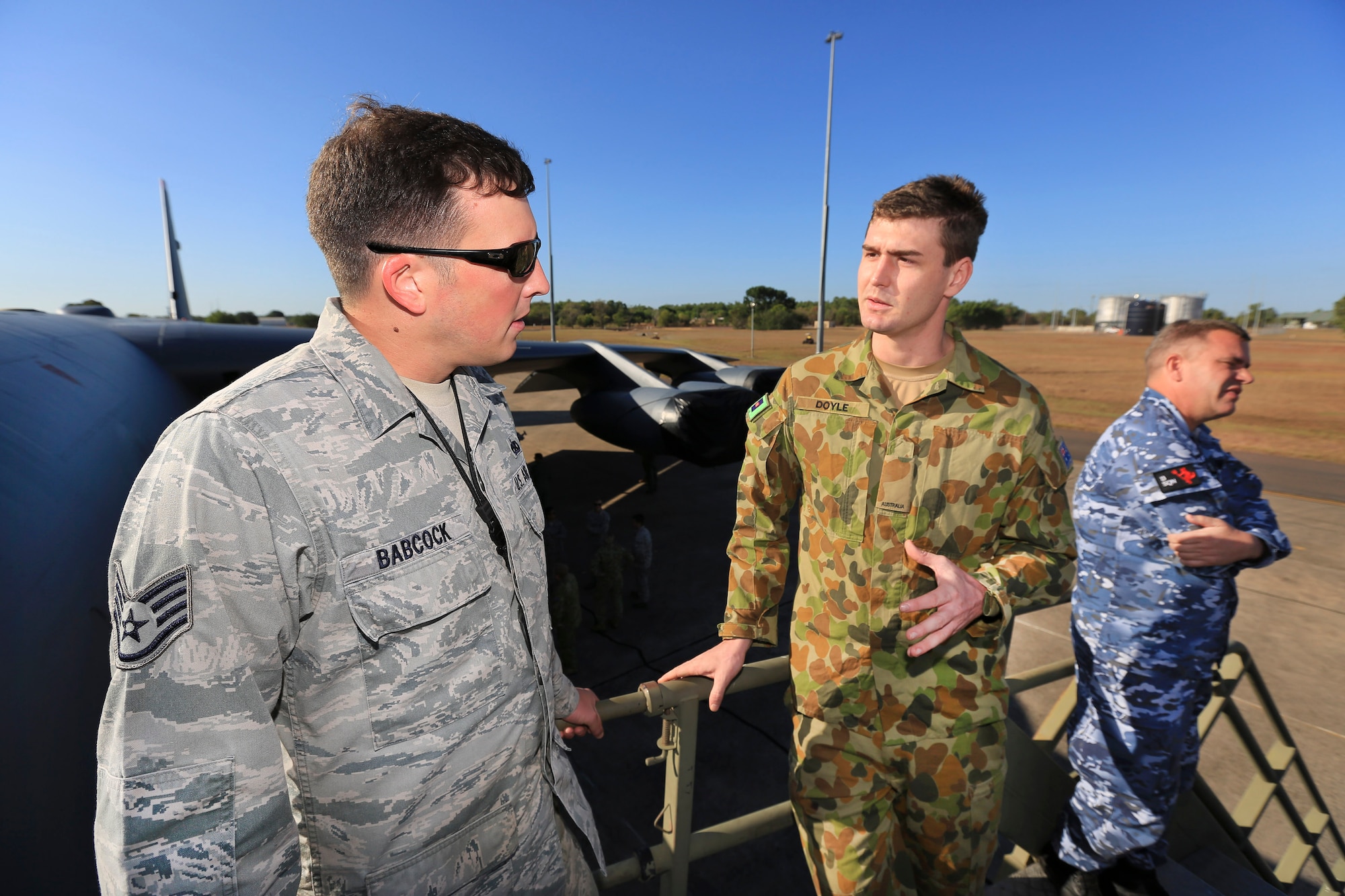 U.S. and Royal Australian Air Force members discuss capabilities of the U.S. Air Force B-52 Stratofortress bomber during a static display, June 20, 2016, Royal Australian Air Force Base Darwin, Australia. The U.S. aircraft and crew were in the region as part of U.S. Pacific Command’s Continuous Bomber Presence operations designed to demonstrate U.S. commitment to the Indo-Asia-Pacific Region and enhance regional security. (Royal Australian Air Force photo by Cpl. Craig Barrett/Released)