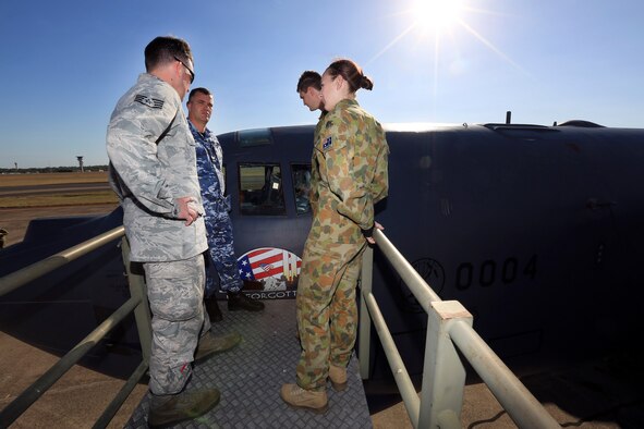 U.S. and Royal Australian Air Force members discuss capabilities of the U.S. Air Force B-52 Stratofortress bomber during a static display, June 20, 2016, Royal Australian Air Force Base Darwin, Australia. The U.S. aircraft and crew were in the region as part of U.S. Pacific Command’s Continuous Bomber Presence operations designed to demonstrate U.S. commitment to the Indo-Asia-Pacific Region and enhance regional security. (Royal Australian Air Force photo by Cpl. Craig Barrett/Released)