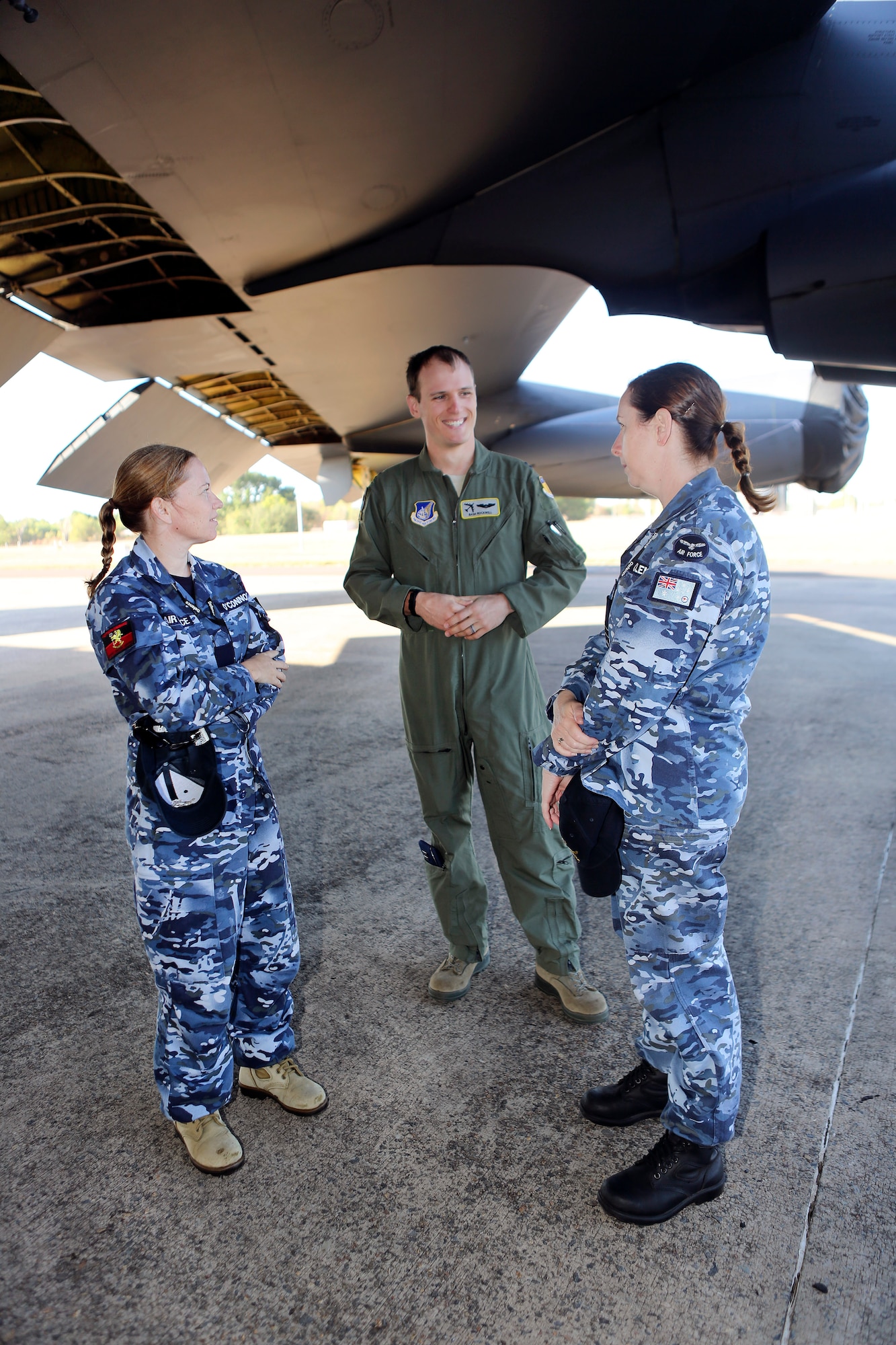 U.S. and Royal Australian Air Force members discuss capabilities of the U.S. Air Force B-52 Stratofortress bomber during a static display, June 20, 2016, Royal Australian Air Force Base Darwin, Australia. The U.S. aircraft and crew were in the region as part of U.S. Pacific Command’s Continuous Bomber Presence operations designed to demonstrate U.S. commitment to the Indo-Asia-Pacific Region and enhance regional security. (Royal Australian Air Force photo by Cpl. Craig Barrett/Released)