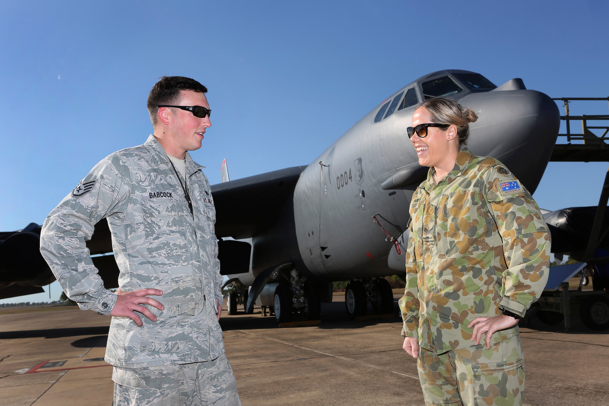 U.S. and Royal Australian Air Force members discuss capabilities of the U.S. Air Force B-52 Stratofortress bomber during a static display, June 20, 2016, Royal Australian Air Force Base Darwin, Australia. The U.S. aircraft and crew were in the region as part of U.S. Pacific Command’s Continuous Bomber Presence operations designed to demonstrate U.S. commitment to the Indo-Asia-Pacific Region and enhance regional security. (Royal Australian Air Force photo by Cpl. Craig Barrett/Released)