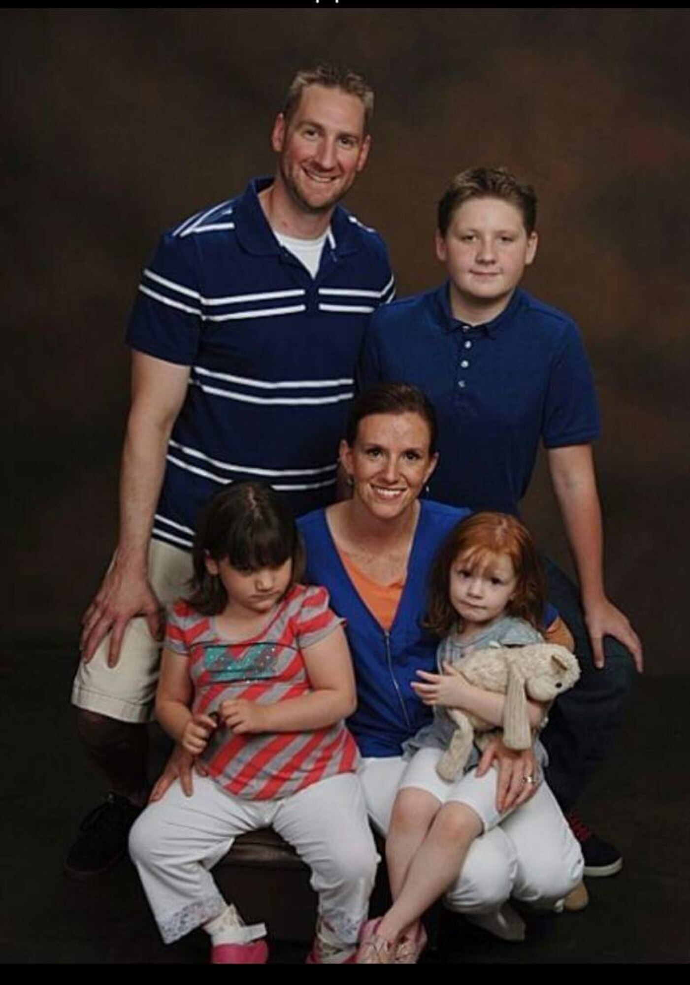 Master Sgt. Dustin and Sarah Dallis are the parents of daughters Ellie, 5½, and Liberty, 3½. Dusty also has a son, Dylan,  12. The couple relies on the four pillars of resilience – physical, social, mental and spiritual – for balance in their lives. (Contributed photo)