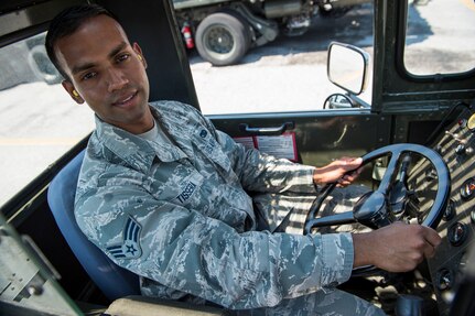 Senior Airman Nadira Tissera, a 437th Aerial Port Squadron ramp services journeyman, prepares to operate a 60K loader on the flightline, June 22, 2916 at Joint Base Charleston, S.C. Tissera has plans to visit his family in Pennsylvania for a family barbeque during the 4th of July. He was born in Sri Lanka and says he is grateful to be a part of a free country and to be serving in the military. (U.S. Air Force photo/Staff Sgt. Jared Trimarchi)