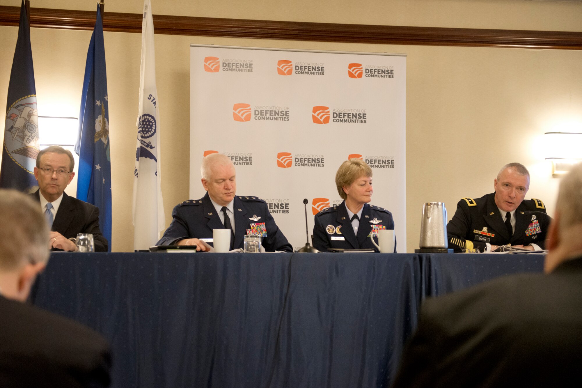 Army Maj. Gen. Michael R. Smith (right), deputy chief, Army Reserve answers a question during a panel discussion at the 2016 Defense Communities National Summit, held in Washington, D.C. June 20-22.The other members of the panel were Lt. Gen. L. Scott Rice (left), the director of the Air National Guard and Maj. Gen. Maryanne Miller, deputy to the chief of the Air Force Reserve. (U.S. Air National Guard photo/Master Sgt. Marvin R. Preston/Released)