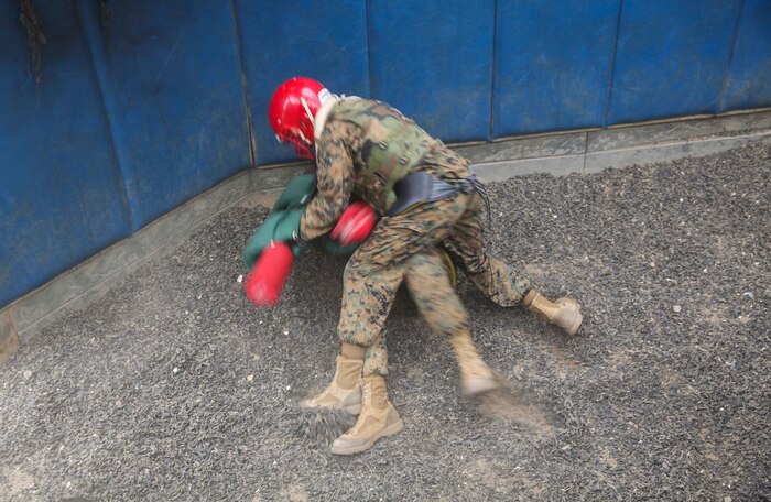 Recruits from India Company, 3rd Recruit Training Battalion, compete against each other during Pugil Sticks III at Marine Corps Recruit Depot San Diego, June 21. The match was won when a recruit delivered multiple body strikes or a single blow to the head. Annually, more than 17,000 males recruited from the Western Recruiting Region are trained at MCRD San Diego. India Company is scheduled to graduate July 15.