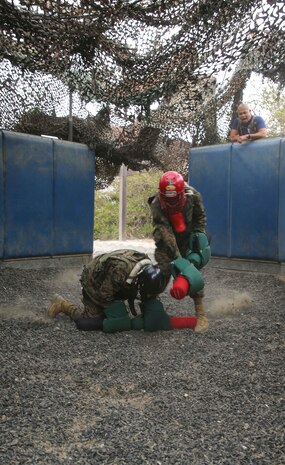 Recruits from India Company, 3rd Recruit Training Battalion, compete against each other during Pugil Sticks III at Marine Corps Recruit Depot San Diego, June 21. Recruits were taught offensive and defensive techniques during Marine Corps Martial Arts Program classes, which included learning bayonet techniques with their rifles. Annually, more than 17,000 males recruited from the Western Recruiting Region are trained at MCRD San Diego. India Company is scheduled to graduate July 15.