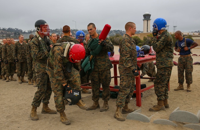 Recruits from India Company, 3rd Recruit Training Battalion, prepare to compete against each other during Pugil Sticks III at Marine Corps Recruit Depot San Diego, June 21. Recruits were given protective gear that consisted of a flak jacket, groin protector, helmet and a pugil stick that simulated a rifle. Annually, more than 17,000 males recruited from the Western Recruiting Region are trained at MCRD San Diego. India Company is scheduled to graduate July 15.