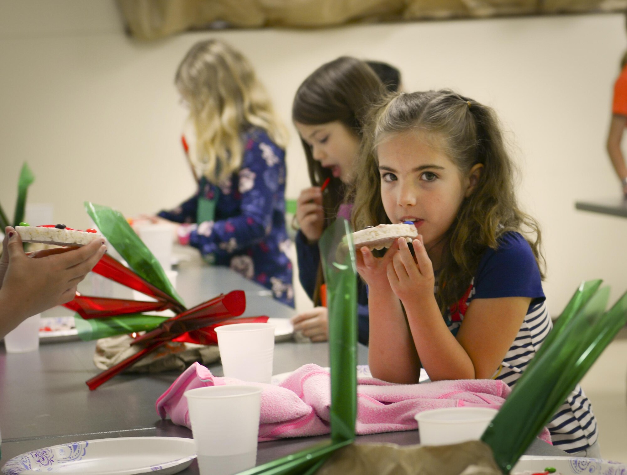 Children participate in snack time during Yokota’s Annual Vacation Bible School at Yokota Air Base, Japan, June 22, 2016. Yokota personnel enrolled approximately 150 children in the main base chapel’s 2016 VBS, where children participated in various activities such as song and dance, science experiments and snack time. (U.S. Air Force photo by Airman 1st Class Elizabeth Baker/Released)