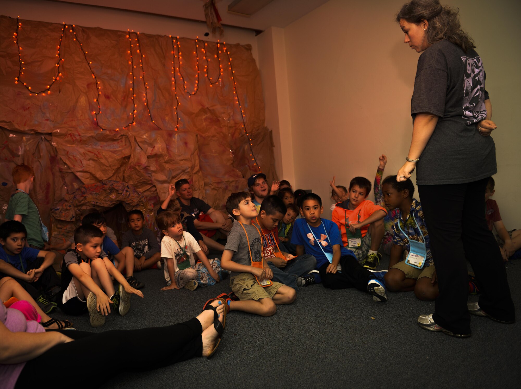 Children discuss examples from their life to support a lesson during Yokota’s Annual Vacation Bible School at Yokota Air Base, Japan, June 22, 2016. Approximately 60 volunteers worked to decorate Yokota’s main chapel and lead over 150 children during this year’s cave-themed VBS. (U.S. Air Force photo by Airman 1st Class Elizabeth Baker/Released)