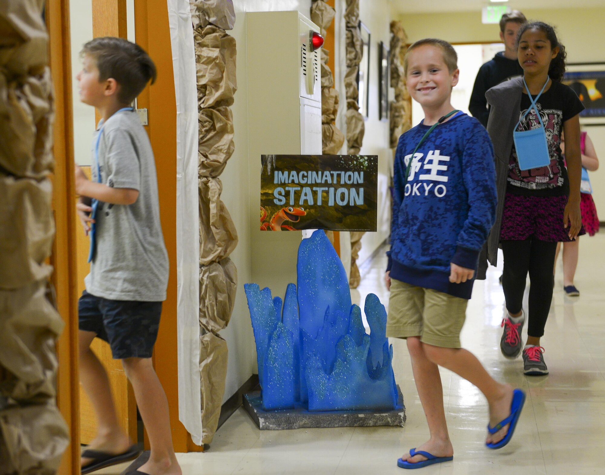 Participants in Yokota’s Annual Vacation Bible School move to their next activity at Yokota Air Base, Japan, June 22, 2016. Yokota personnel enrolled approximately 150 children in the main base chapel’s 2016 VBS, where children participated in various activities such as song and dance, science experiments and snack time. (U.S. Air Force photo by Airman 1st Class Elizabeth Baker/Released)