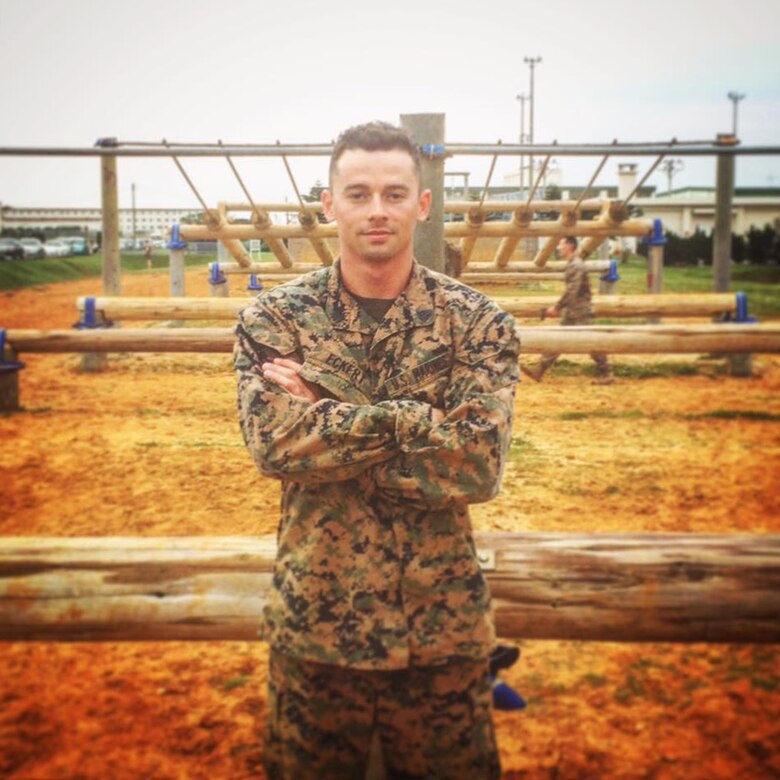 U.S. Marine Corps Sgt. Michael Eckert poses after completing the military obstacle course at Camp Hansen, Okinawa, Japan in April 2016. Eckert beat the original record time of one minute 17 seconds, with 58 seconds while attending sergeants course. (Courtesy Photo)