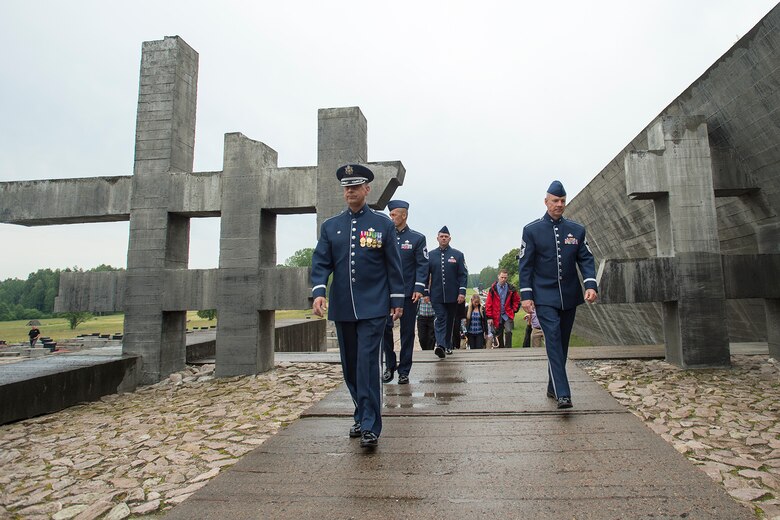 Members of the U.S. Air Forces in Europe Band receive a tour of the Khatyn Memorial in Belarus, June 20, 2016. The USAFE band is in Belarus to perform and commemorate the alliance that ended the greatest conflict of the 20th Century. (U.S. Air Force photo/Technical Sgt. Paul Villanueva II)
