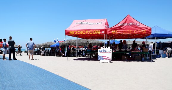 Marines, Sailors and family members of Combat Logistics Battalion 5, 1st Marine Logistics Group, enjoy food, fun, and festivities hosted by volunteers from Saddleback Church and Marine Corps Camp Services aboard Camp Pendleton, Calif., June 17, 2016. Aside from offering service members and their families some time to come together and relax, the event supported the 101 Days of Summer Campaign, which aims to promote increased safety during the summer months. (U.S. Marine Corps Photos by Sgt. Carson Gramley/released)