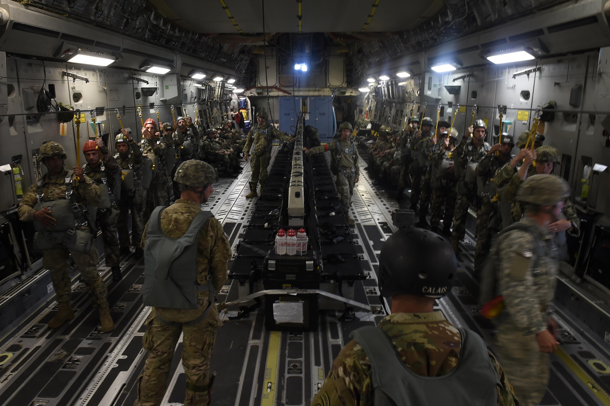 82nd Airborne Division and French paratroopers prepare to conduct a static-line jump from a 62nd Airlift Wing C-17 Globemaster III June 22, 2016, near Libreville, Gabon Africa during exercise Central Accord 2016. U.S. Army Africa's exercise Central Accord 2016 is an annual, combined, joint military exercise that brings together partner nations to practice and demonstrate proficiency in conducting peacekeeping operation. (U.S. Air Force photo/Tech. Sgt. Tim Chacon)