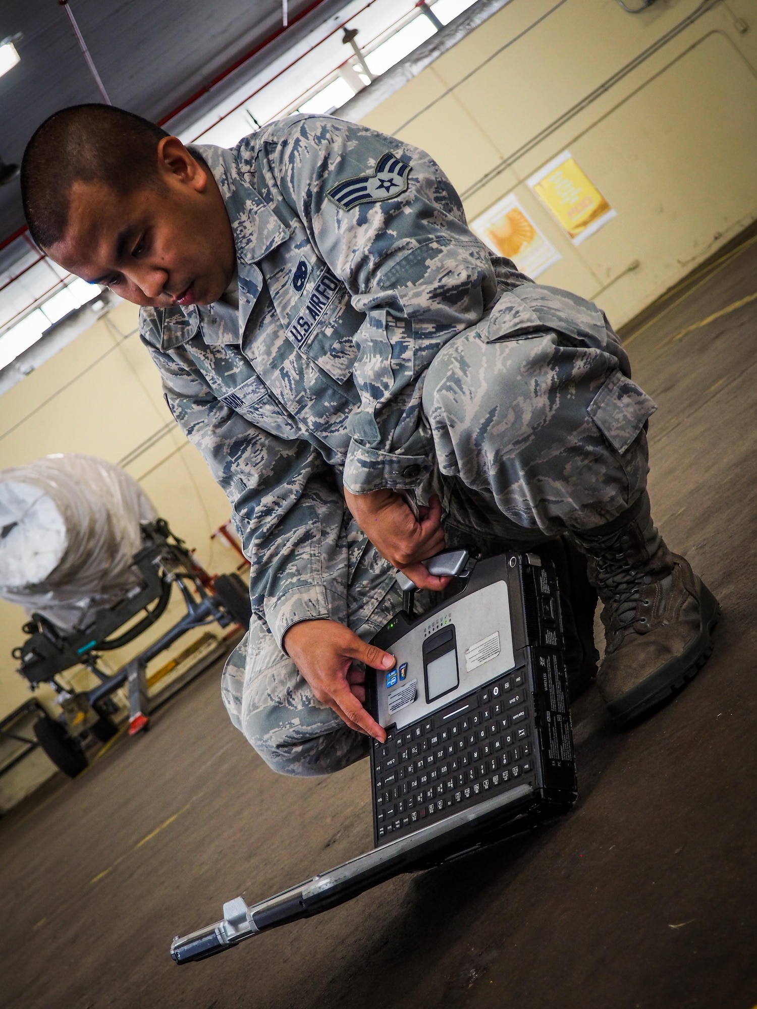 Senior Airman Jovie Abaya, 96th Aircraft Maintenance Unit aerospace propulsion technician, fastens a speed handle into a sized socket at Barksdale Air Force Base, La., June 22, 2016. Propulsion technicians train to provide on-site flightline maintenance to aircraft at a moment’s notice and have access to a variety of toolkits with the capability to repair most issues. (U.S. Air Force photo/Senior Airman Mozer O. Da Cunha)