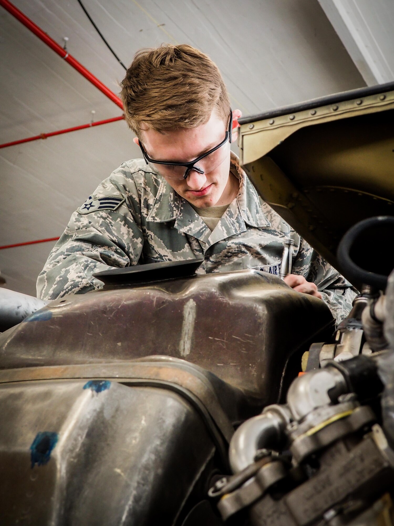 Senior Airman Jovie Abaya, 96th Aircraft Maintenance Unit aerospace propulsion technician, fastens a speed handle into a sized socket at Barksdale Air Force Base, La., June 22, 2016. Propulsion technicians train to provide on-site flightline maintenance to aircraft at a moment’s notice and have access to a variety of toolkits with the capability to repair most issues. (U.S. Air Force photo/Senior Airman Mozer O. Da Cunha)