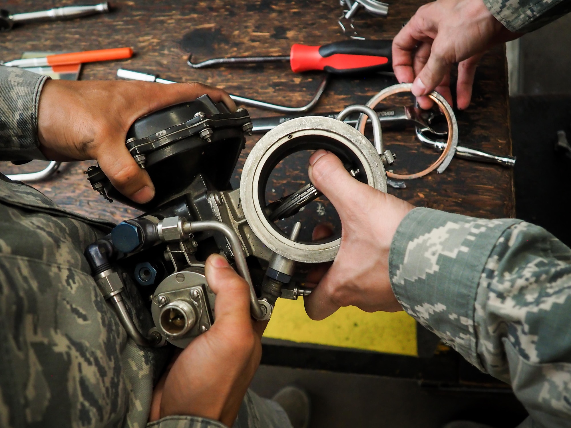 Senior Airman Jovie Abaya, 96th Aircraft Maintenance Unit aerospace propulsion technician, fastens a speed handle into a sized socket at Barksdale Air Force Base, La., June 22, 2016. Propulsion technicians train to provide on-site flightline maintenance to aircraft at a moment’s notice and have access to a variety of toolkits with the capability to repair most issues. (U.S. Air Force photo/Senior Airman Mozer O. Da Cunha)