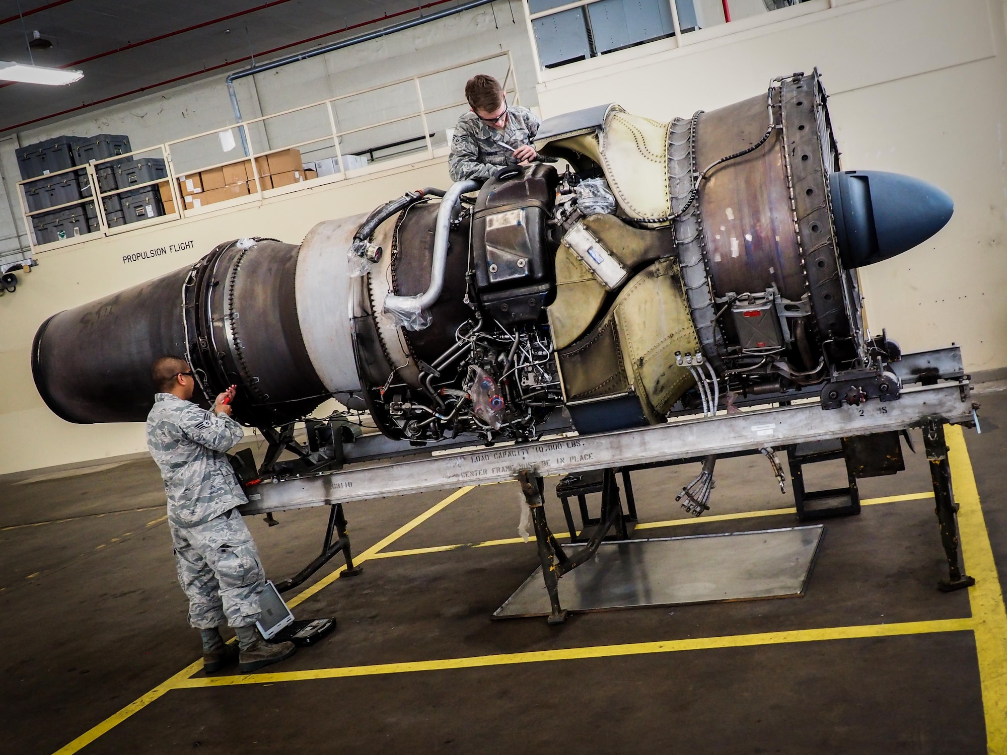 Senior Airman Jovie Abaya, 96th Aircraft Maintenance Unit aerospace propulsion technician, fastens a speed handle into a sized socket at Barksdale Air Force Base, La., June 22, 2016. Propulsion technicians train to provide on-site flightline maintenance to aircraft at a moment’s notice and have access to a variety of toolkits with the capability to repair most issues. (U.S. Air Force photo/Senior Airman Mozer O. Da Cunha)