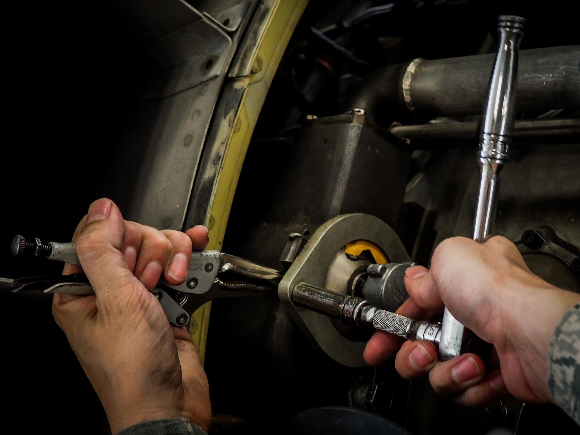 Senior Airman Jovie Abaya, 96th Aircraft Maintenance Unit aerospace propulsion technician, fastens a speed handle into a sized socket at Barksdale Air Force Base, La., June 22, 2016. Propulsion technicians train to provide on-site flightline maintenance to aircraft at a moment’s notice and have access to a variety of toolkits with the capability to repair most issues. (U.S. Air Force photo/Senior Airman Mozer O. Da Cunha)