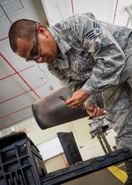 Senior Airman Jovie Abaya, 96th Aircraft Maintenance Unit aerospace propulsion technician, fastens a speed handle into a sized socket at Barksdale Air Force Base, La., June 22, 2016. Propulsion technicians train to provide on-site flightline maintenance to aircraft at a moment’s notice and have access to a variety of toolkits with the capability to repair most issues. (U.S. Air Force photo/Senior Airman Mozer O. Da Cunha)