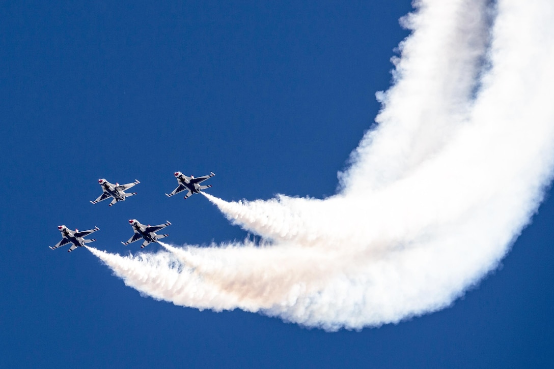 Pilots with the Thunderbirds, the Air Force’s flight demonstration team, perform during the Warriors over the Wasatch air show at Hill Air Force Base, Utah, June 25, 2016. Air Force photo by Tech. Sgt. Christopher Boitz