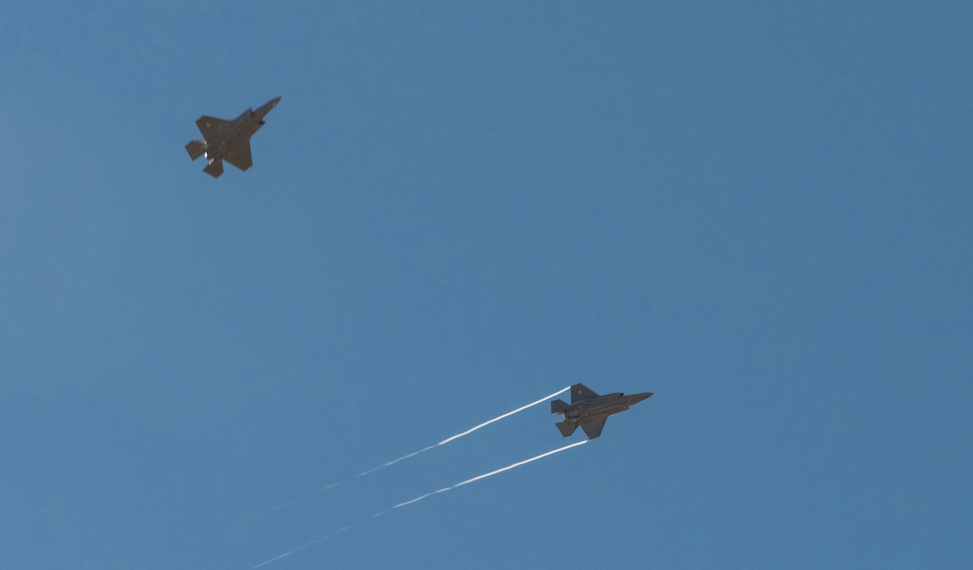 An F-35A seperates from formation to land at Mountain Home Air Force Base, Idaho, for a training exercise June 6-17. Mountain Home AFB's airspace allows Hill Air Force Base's active duty 388th Fighter Wing and reserve 419th Fighter Wing to fully test the aircraft in preperations for declaring initial operational capability later this year. (U.S. Air Force photo by Airman Alaysia Berry/Released)