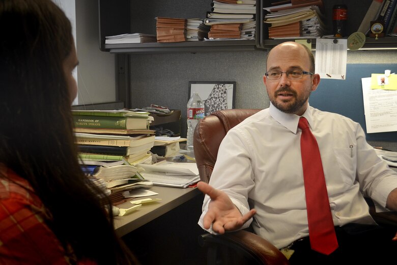 Joe Griffin (right), senior archeologist for the Army Corps of Engineers Sacramento District, talks with colleague Stefanie Adams, cultural resources specialist on June 22, in Sacramento, California. Griffin was the sole archeological expert on a recovery team sent by the Defense POW/MIA Accounting Agency (DPAA) to recover the remains of an American pilot shot down over Laos during the Vietnam War at a decades-old aircraft crash site in the Xiangkhoang Province, Lao People’s Democratic Republic. (U.S. Army photo by Randy Gon/RELEASED)