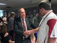 A standing-room-only crowd of Walla Walla District employees, retirees, and family members honored Wayne H. John, retired Walla Walla District chief of Operations Division, as he was recognized as the Distinguished Civilian Employee of the Year during a June 24 ceremony at the District Headquarters in Walla Walla, Washington.