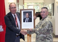 U.S. Army Corps of Engineers, Walla Walla District Commander Lt. Col. Timothy Vail honored Wayne H. John, retired Walla Walla District chief of Operations Division, as the Distinguished Civilian Employee of the Year during an award ceremony held June 24 at the District Headquarters in Walla Walla, Washington.  