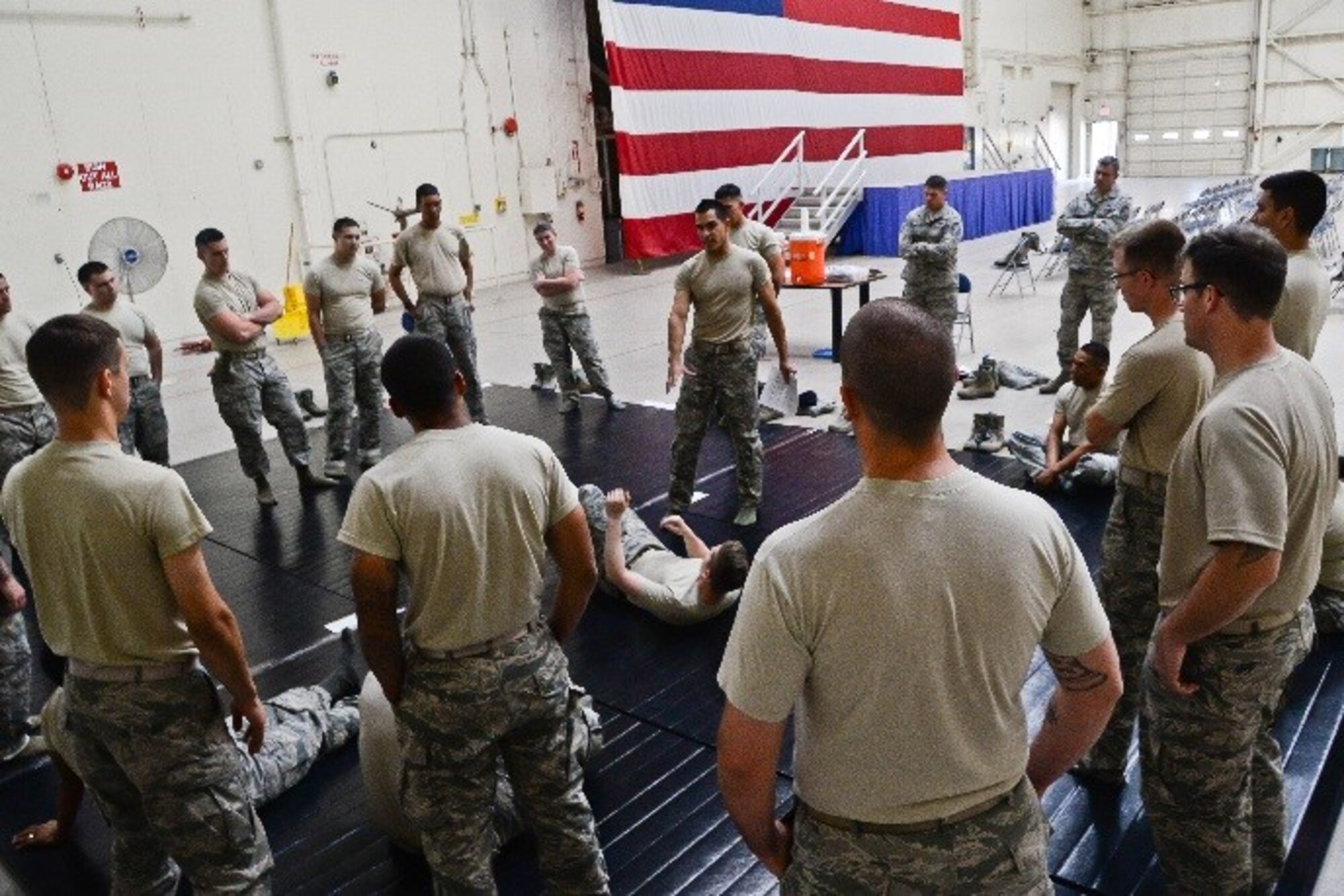 Staff Sgt. Jeffrey Seastrand, 944th Security Forces Squadron, teaches defensive techniques during a combatives course June 4, 2016 inside Hangar 999 at Luke Air Force Base, Ariz. The combatives course is an annual requirement for security forces Airmen. (U.S. Air Force photo by Staff Sgt. Nestor Cruz)