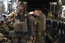A French Paratrooper prepares for a static-line jump of a 62nd Airlift Wing C-17 Globemaster III June 22, 2016 near Libreville, Gabon Africa during Central Accord 2016. U.S. Army Africa's exercise Central Accord 2016 is an annual, combined, joint military exercise that brings together partner nations to practice and demonstrate proficiency in conducting peacekeeping operation. (U.S. Air Force photo/Tech. Sgt. Tim Chacon)