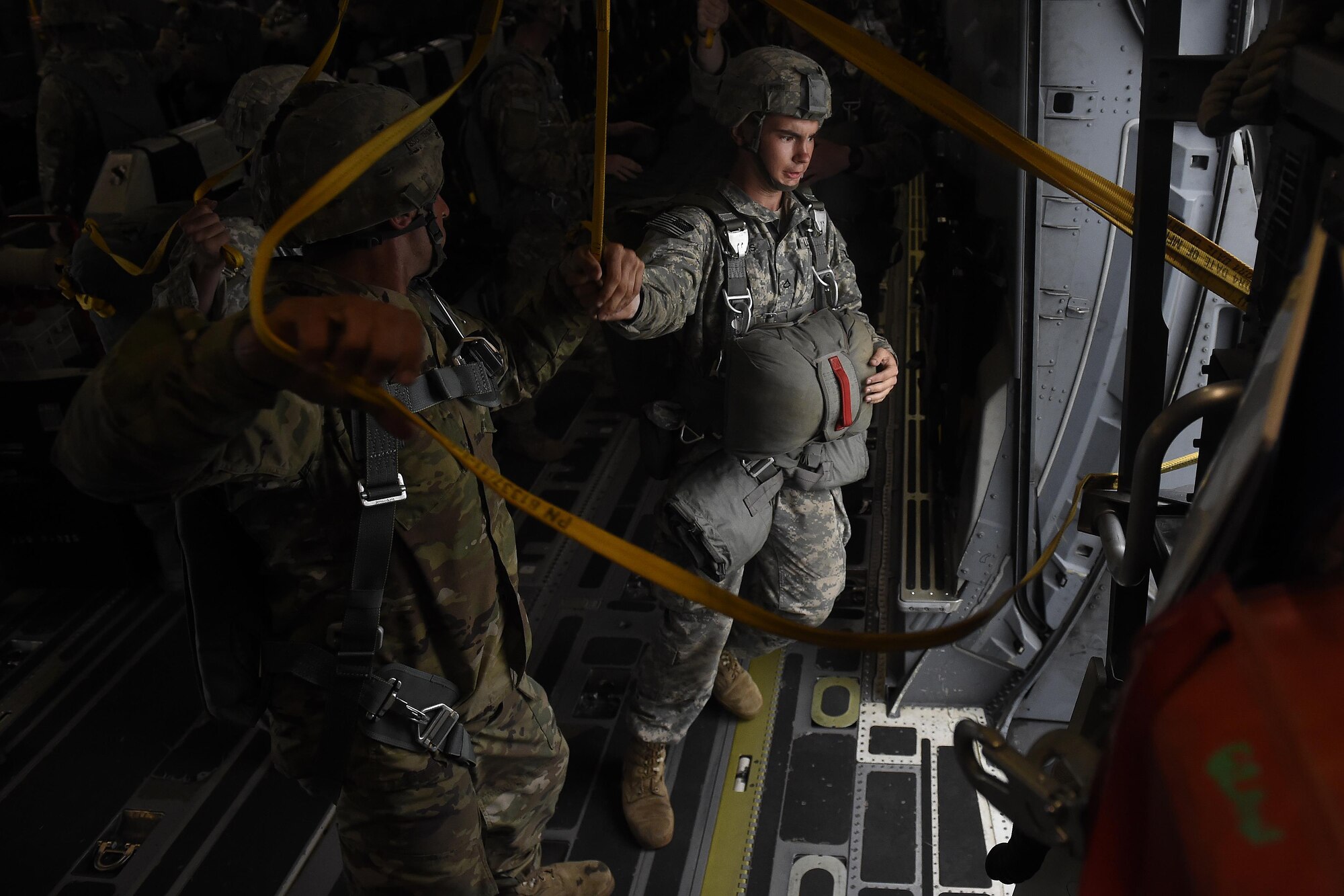 82nd Airborne Division and French paratroopers prepare to conduct a static-line jump from a 62nd Airlift Wing C-17 Globemaster III June 22, 2016 near Libreville, Gabon Africa during exercise Central Accord 2016. U.S. Army Africa's exercise Central Accord 2016 is an annual, combined, joint military exercise that brings together partner nations to practice and demonstrate proficiency in conducting peacekeeping operation. (U.S. Air Force photo/Tech. Sgt. Tim Chacon)