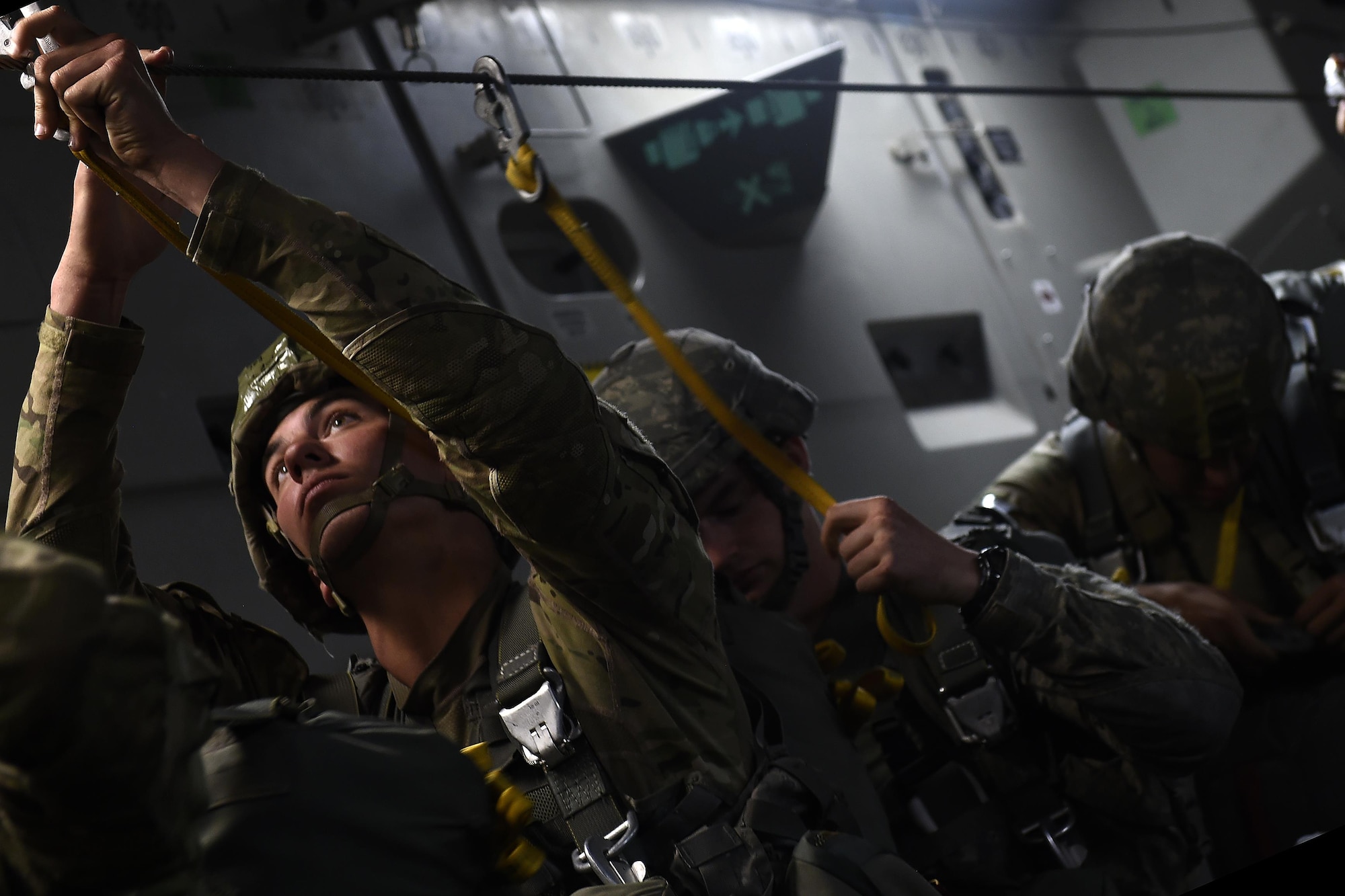 82nd Airborne Division paratroopers, Fort Bragg, N.C., prepare to conduct a static-line jump out of a 62nd Airlift Wing C-17 Globemaster III aircraft June 20, 2016, in Libreville, Gabon Africa during exercise Central Accord 2016. U.S. Army Africa's exercise Central Accord 2016 is an annual, combined, joint military exercise that brings together partner nations to practice and demonstrate proficiency in conducting peacekeeping operation.  (U.S. Air Force photo/Tech. Sgt. Tim Chacon)