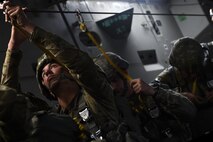 82nd Airborne Division paratroopers, Fort Bragg, N.C., prepare to conduct a static-line jump out of a 62nd Airlift Wing C-17 Globemaster III aircraft June 20, 2016, in Libreville, Gabon Africa during exercise Central Accord 2016. U.S. Army Africa's exercise Central Accord 2016 is an annual, combined, joint military exercise that brings together partner nations to practice and demonstrate proficiency in conducting peacekeeping operation.  (U.S. Air Force photo/Tech. Sgt. Tim Chacon)