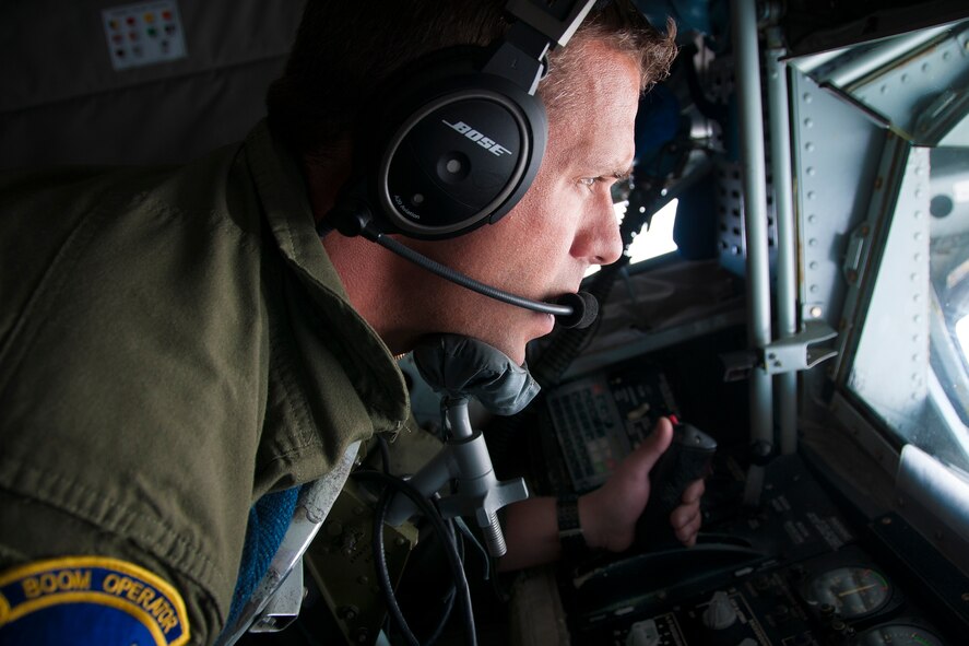 Technical Sgt. Casey Hall, 756th Air Refueling Squadron boom operator, looks out of a boom pod window during a refueling mission over Norway June 13, 2016. Boom operators play an integral role in pre-flight preparation and are responsible for fuel delivery from 459th Air Refueling Wing's KC-135R Stratotankers to various receivers. Members of the 459th ARW, to include pilots, boom operators and maintainers, are in Europe from mid-June to late July to help provide training and refueling support for Operation Atlantic Resolve. OAR aims to ensure peace and stability in Eastern Europe in the wake of Russia’s intervention in Ukraine. (U.S. Air Force photo/Staff Sgt. Kat Justen)