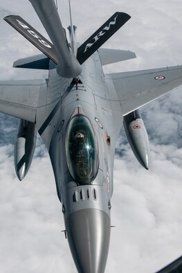 A Norwegian Air Force F-16 is refueled by a 459th Air Refueling Wing KC-135R Stratotanker over Norway June 13, 2016. Members of the 459th ARW, to include pilots, boom operators and maintainers, are in Europe from mid-June to late July to help provide training and refueling support for Operation Atlantic Resolve. OAR aims to ensure peace and stability in Eastern Europe in the wake of Russia’s intervention in Ukraine.  (U.S. Air Force photo/Staff Sgt. Kat Justen)